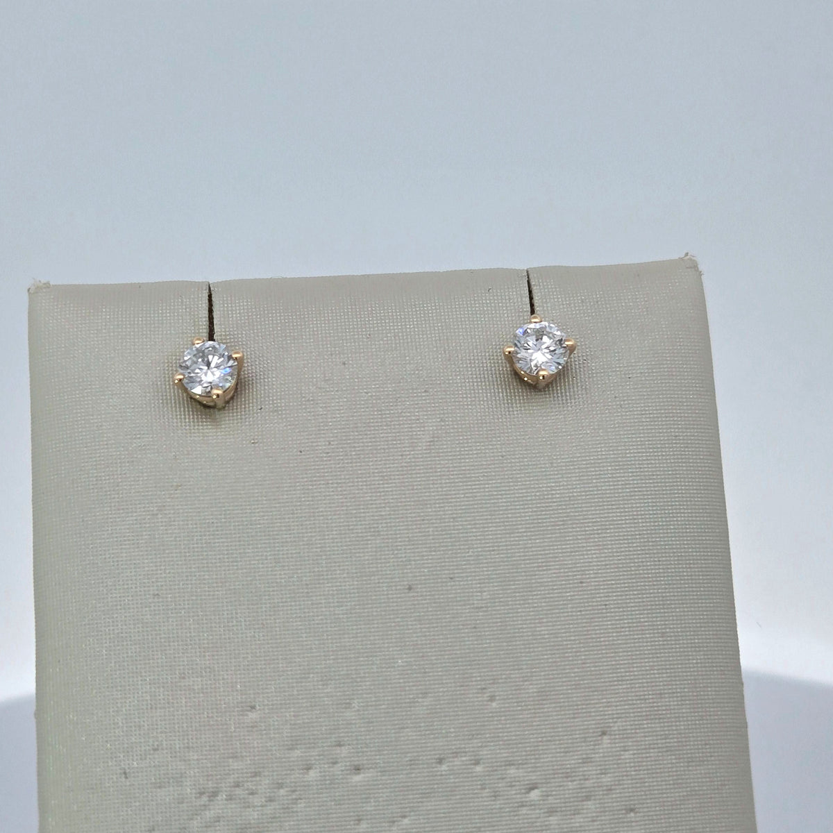 2.15 carat total weight lab-grown round diamond stud earrings in 14K yellow gold