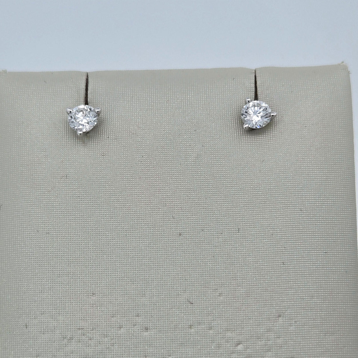 1.10 carat total weight lab-grown round diamond stud earrings in 14K white gold