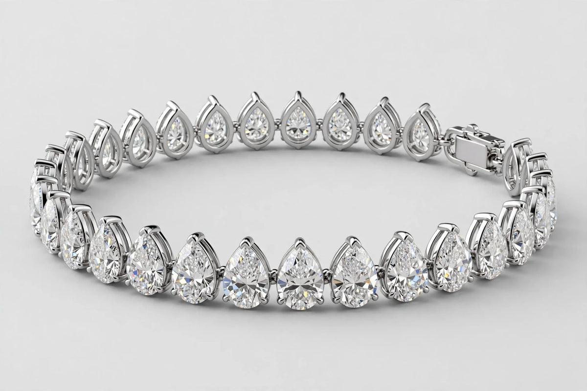 LAB Br pear  14.68ct E F /VS 14KW 13.10g YC