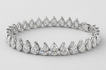 LAB Br pear  14.68ct E F /VS 14KW 13.10g YC