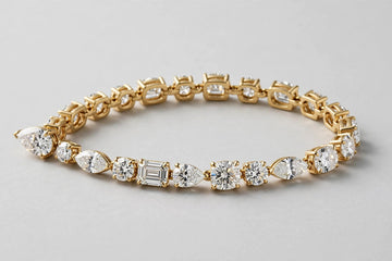 LAB MULTISHAPE W/PEAR TENNIS BRACELET 7.55CT 14KY 8.95G